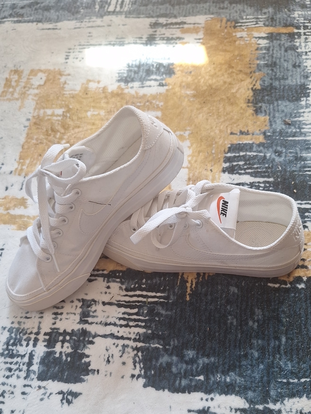 Nike Women’s White Canvas Low-Top Sneakers with Subtle Swoosh